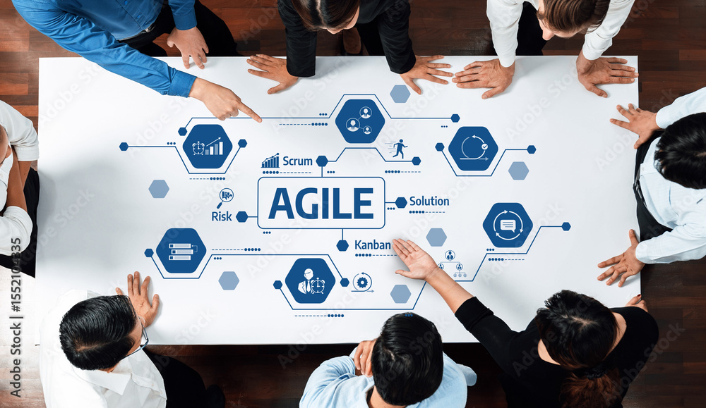 Aufkleber A diverse team engages in a collaborative discussion on Agile project management methodologies like Scrum and Kanban, brainstorming solutions and strategies on a boardroom table. Amity