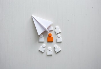 Paper airplane pointing at orange person icon on a white background