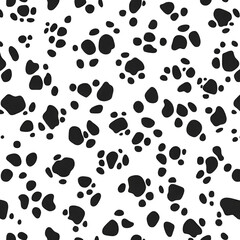 Black background with scattered abstract paw print shapes creating a playful and artistic texture suitable for various design projects and themes.