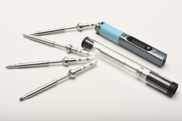 New electronic soldering irons with stingers. Modern tin soldering tools.