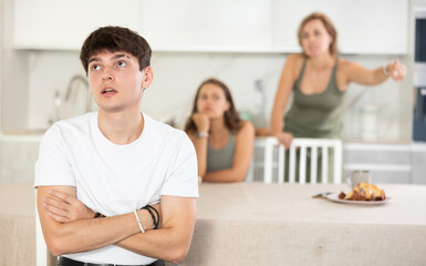 Quarrel of mom, girl and guy. Woman and girl shouts at guy and accuses her