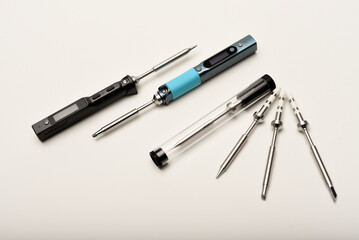 New electronic soldering irons with stingers. Modern tin soldering tools.