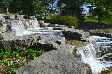 Flowing water - waterfall in public park