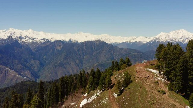 Scenic drone view of Shogran hill station in Kaghan valley in northern Pakistan, with plants