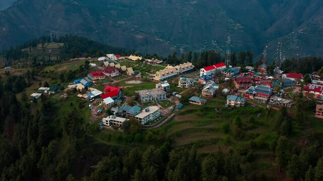 Scenic drone view of Shogran hill station in Kaghan Valley in the north Pakistan, with small houses