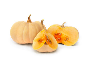 Fresh whole, half and sliced pumpkins on a white background with space for text