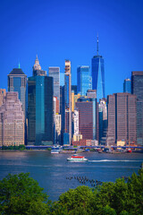 New York City skyline and harbor featuring Lower Manhattan and the Financial District, viewed from Brooklyn Heights Promenade, NY, USA