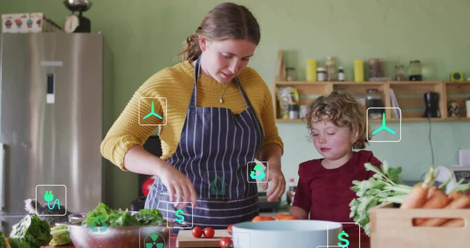 Mother guiding son slicing carrot rounds on wooden board in cooking lesson teaching cooking skills