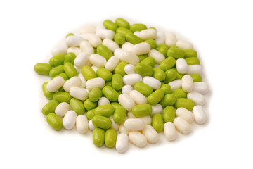 Sweet multicolored candies isolated on white background.