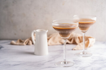 Chocolate Truffle Martini glass or espresso Martini Cocktail based on coffee, liqueur and vodka. Alcoholic drink. Space for text. High quality photo