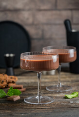 Chocolate Truffle Martini glass or espresso Martini Cocktail based on coffee, liqueur and vodka. Alcoholic drink. Space for text. High quality photo