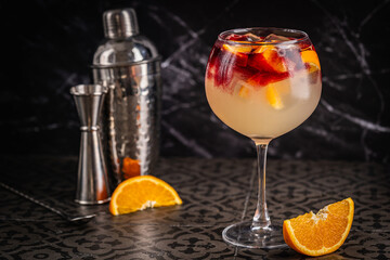 Glass of red wine spanish famous traditional fruity sangria gourmet cocktail or vino de verano, tinto de verano drink. High quality photo