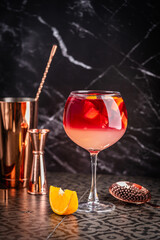 Glass of red wine spanish famous traditional fruity sangria gourmet cocktail or vino de verano,...