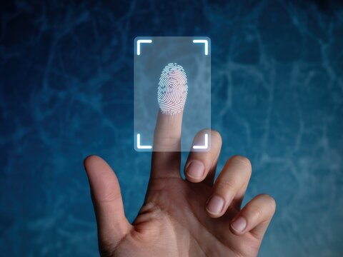 Finger touching a futuristic fingerprint scanner, scanning fingerprint for identification. - Powered by Adobe