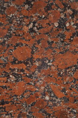 Dark stone marble surface with multi-colored inclusions
