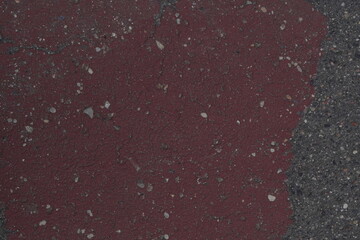 Dark stone marble surface with multi-colored inclusions