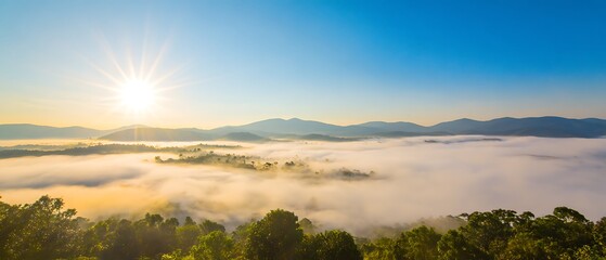 Fototapeta premium Sunrise over misty mountains