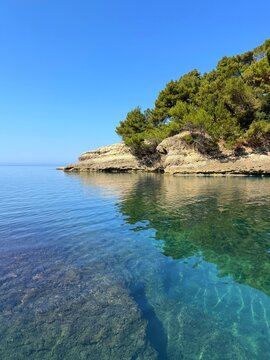 Mediterranean turquoise blue sea and rocky coast.