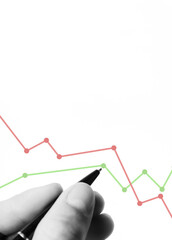 Conducting market analysis to increase sales in business, businessman's hand with pen analyzes...