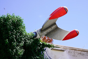 fake missile rocket planted in the roof of a house building