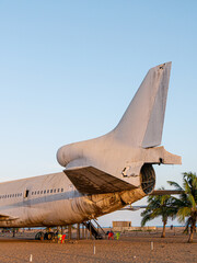 Barakah, the abandoned plane on the beach in Cotonou, Benin, during sunset