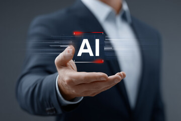 A professional holding an artificial intelligence (AI) hologram with a futuristic touch. This image showcases the concept of AI technology in a modern workplace