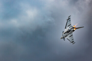 German fighter jet turning with afterburners