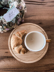 Cozy Morning Scene with Coffee and Croissant on a Light Background
