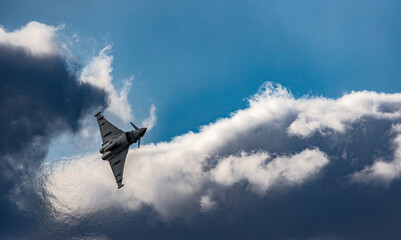 German fighter jet turning with afterburners © Radek