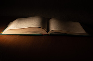 open book on black background