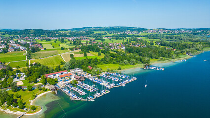 Aerial view of Prien am Chiemsee, a charming Bavarian town on the shore of Lake Chiemsee. Captured...