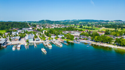 Aerial view of Prien am Chiemsee, a charming Bavarian town on the shore of Lake Chiemsee. Captured...