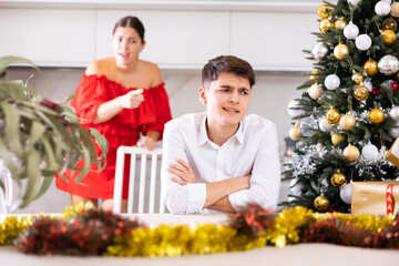 Family domestic quarrel - wife yells at husband during christmas celebration