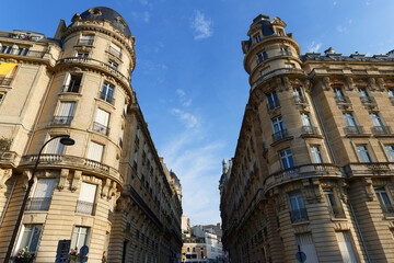 Paris, typical facades and windows, beautiful buildings, with old zinc roofs