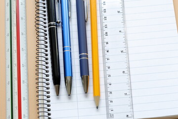 Pencils, rulers and paper. Office work concept.