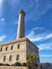 Fototapeta premium Cabo de Palos Lighthouse in La Manga del Mar Menor in Spain in late afternoon