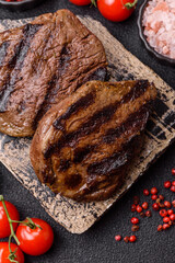 Grilled beef steak meat with salt and pepper. Beef steak grilled on a barbecue