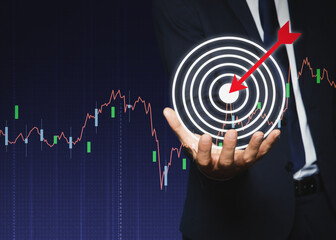 Targeting. Businessman holding virtual aim with arrow against dark blue background, closeup