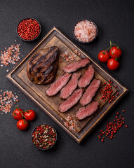 Grilled beef steak meat with salt and pepper. Beef steak grilled on a barbecue