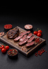 Grilled beef steak meat with salt and pepper. Beef steak grilled on a barbecue