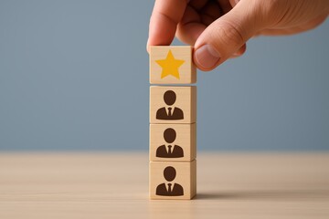 Wooden Blocks Displaying Employee Ranking and Star Symbol