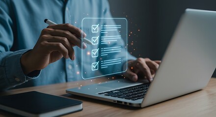 Person working on a laptop using checklist app for task management and digital workflow, ensuring productivity.