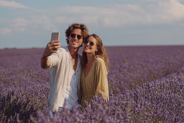 Couple taking selfie in lavender field