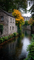 Fototapeta premium A picturesque stone house on a river during autumn