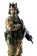 Soldier in full tactical gear with rifle on white background