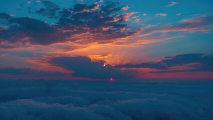 A blue sky at sunset with vibrant colors and clouds.