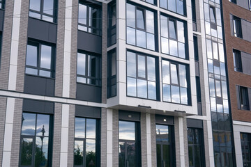 Modern apartment buildings with balconies. Facade of a modern apartment building.