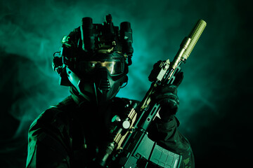 Tactical operative holding advanced weapon in green foggy atmosphere at night