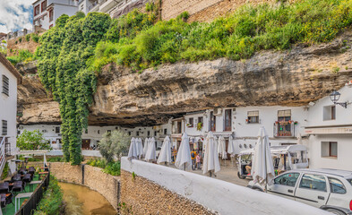 Setenil de las Bodegas, Spain - April 15, 2025: Architecture from the picturesque Setenil de las Bodegas village, Andalusia, Spain.