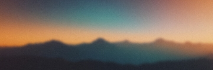 Blurred Mountain Range Sunset Landscape Soft Hues Abstract Background